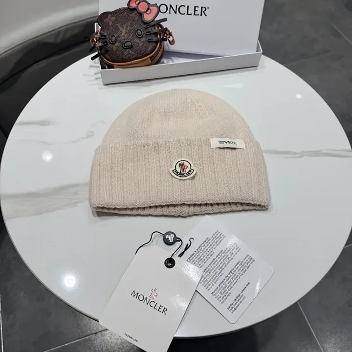 View 1 of Beige Wool Knit Beanie, Subtle Crest, Everyday Luxury