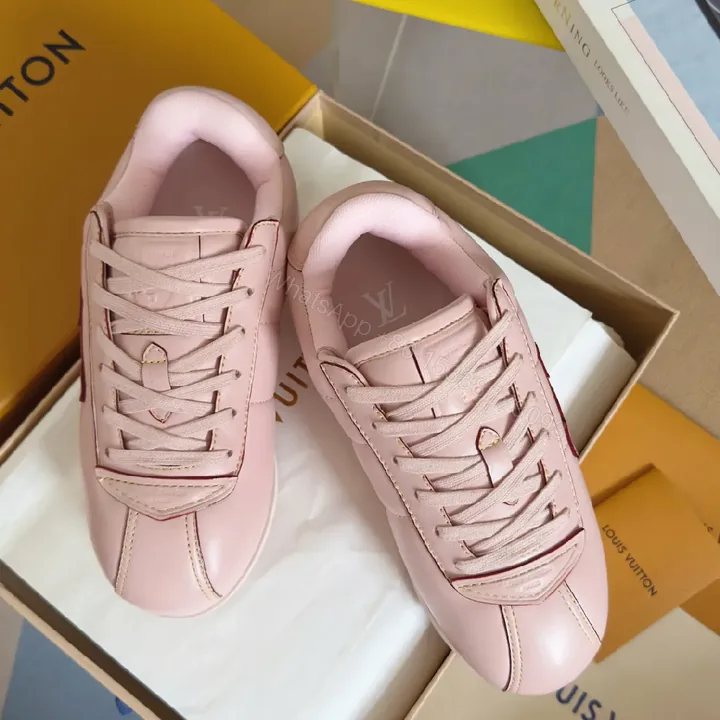 View 1 of Soft Pink Leather High-Tops with Subtle LV-Inspired Detailing