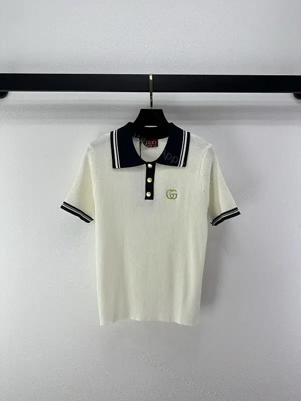 View 1 of Cream/Navy Ribbed Polo Shirt with Gold Accents