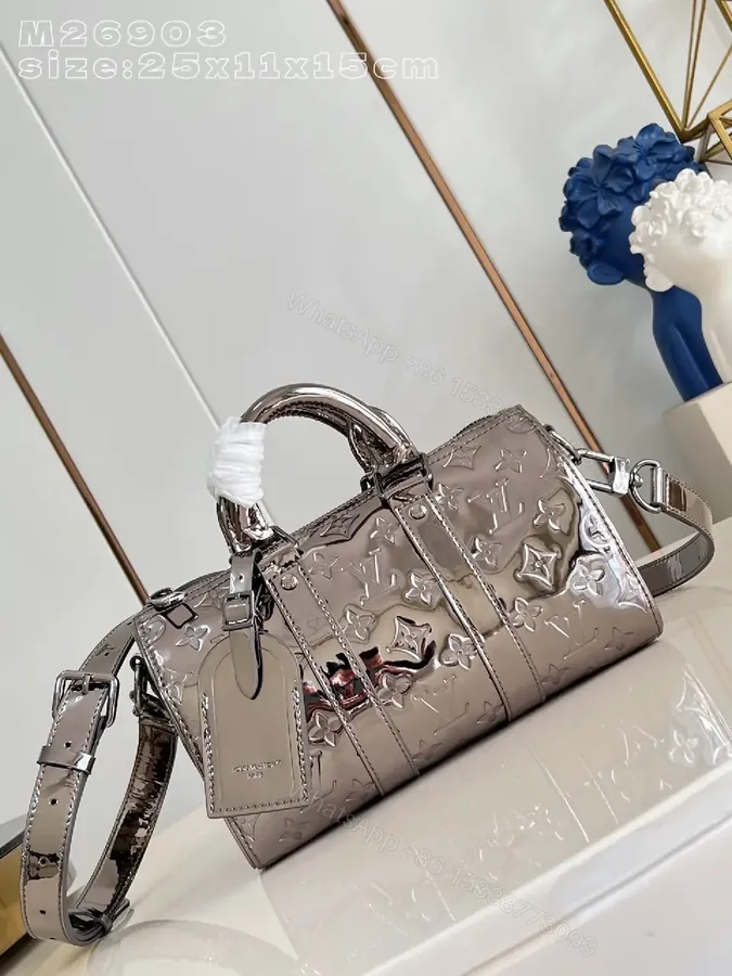 View 1 of Compact Metallic Satchel: Monogram-Texture Carryall