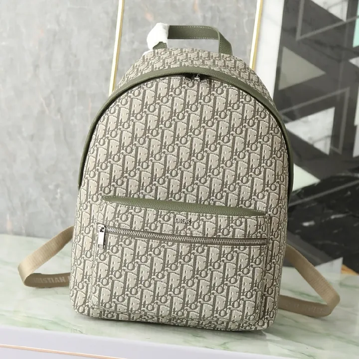 View 1 of Olive Monogram Backpack: Premium Canvas, Compact Design, All-Day Comfort