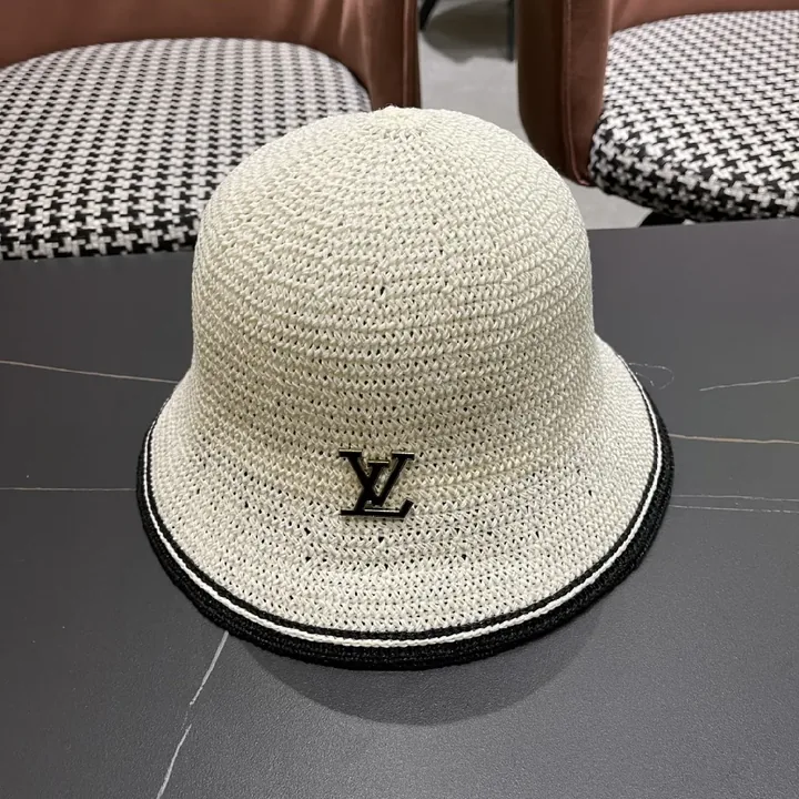View 1 of Chic Straw Bucket Hat with Subtle Luxury Accent