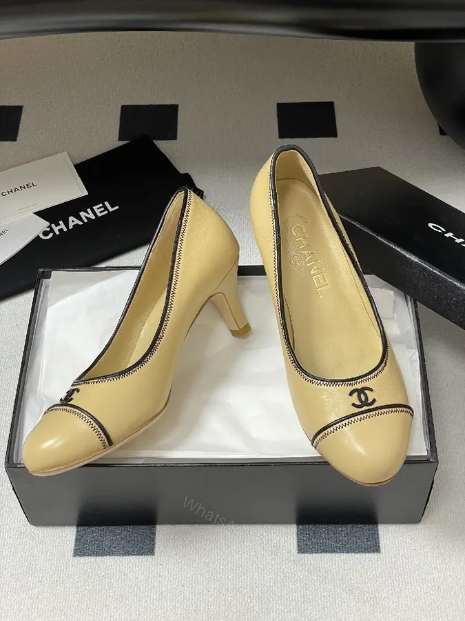 View 1 of Cream Leather Pumps: Chic, Subtle Stitch Detailing, All-Day Comfort