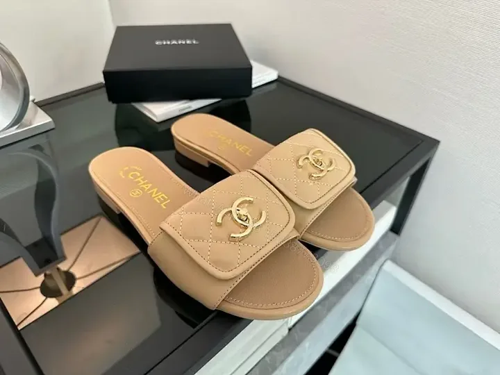 View 1 of Quilted Leather Slide Sandals with Gold Hardware - Luxury Comfort