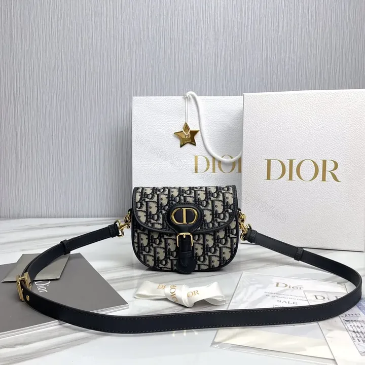 View 1 of Gold Monogram Compact Saddle Bag - Dior-Style, Leather Trim, Crossbody Ready