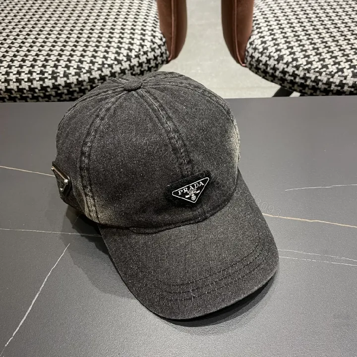 View 1 of Black Denim Cap with Subtle Triangle Emblem