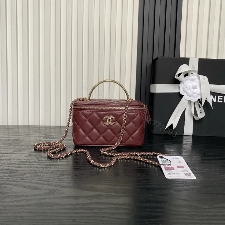 View 1 of Quilted Burgundy Leather Mini Bag - Chain Strap, Gold Hardware