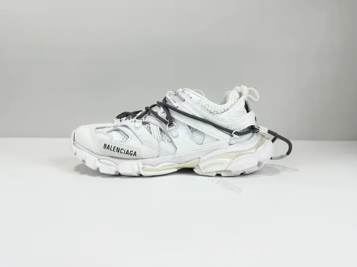 View 1 of White Leather Sculpted-Sole Luxury Sneaker, High-Impact Style