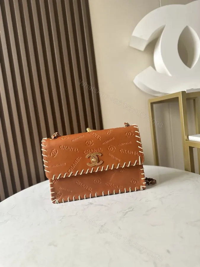 View 1 of Textured Leather Crossbody Wallet Bag with Signature Stitching
