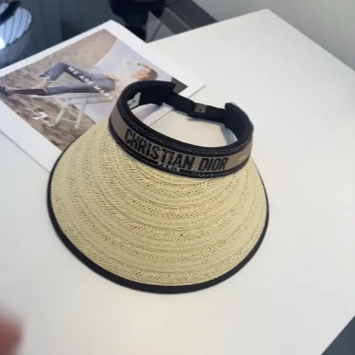 View 1 of Beige Braided Straw Visor Hat with Black Trim and Band