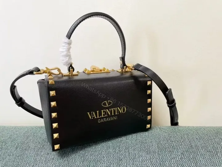 View 1 of Black Leather Rockstud Mini Bag: Structured Luxury Bag