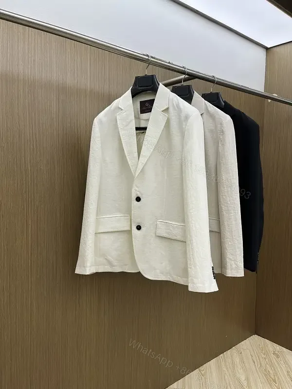 View 1 of Cream Linen-Texture Tailored Blazer with Dual Black Buttons