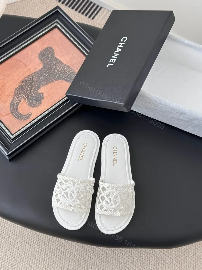 View 1 of Chanel Women White Woven Leather Slides