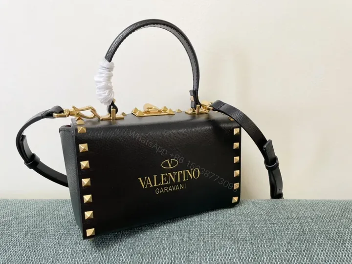 View 1 of Bold Black Leather Handbag with Gold Studs - Valentino Style Bag