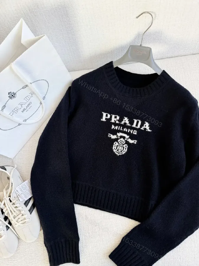 View 1 of Black Knit Logo Crest Luxe Sweater, Relaxed Fit, Premium Knit