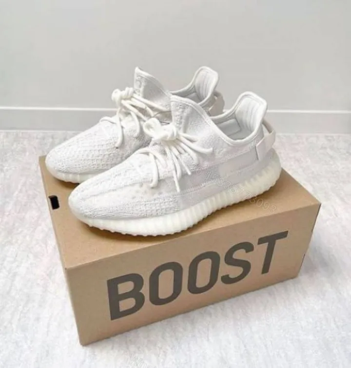 View 1 of First Copy Adidas Yeezy Boost 350 V2 Triple White Men’s Sneakers