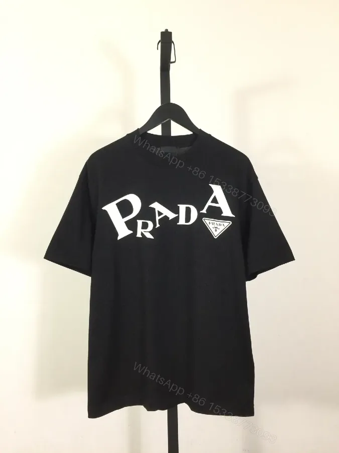 View 1 of Black Cotton Tee | Bold Graphic Logo, Modern Luxe, Casual Suitability