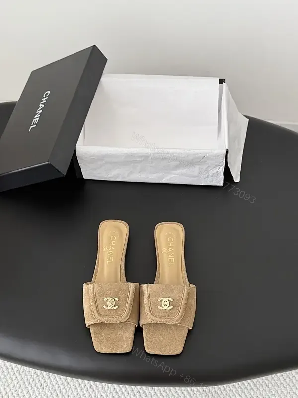 View 1 of Suede Mules with Gold Logo - Chic Luxury, Open-Back Style