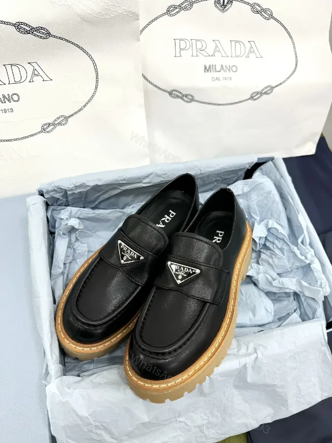 View 1 of Black Leather Loafers: Luxe Signature Crest, Rugged Comfort