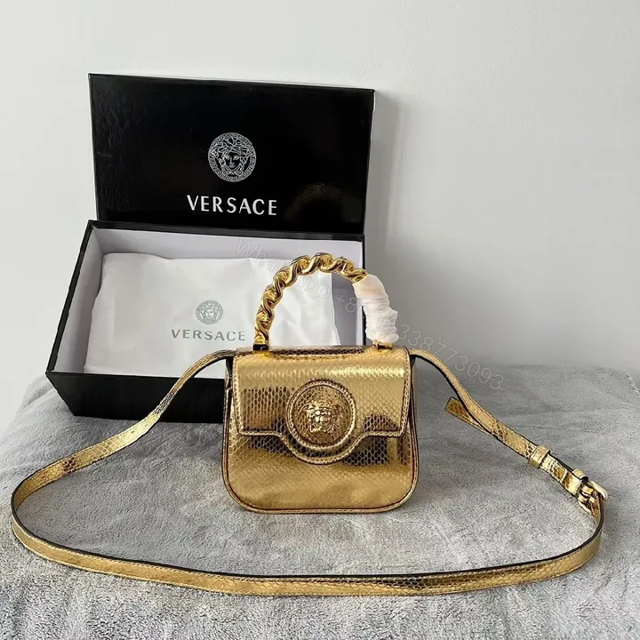 View 1 of Gold Snakeskin Mini Bag with Gourmet Handle
