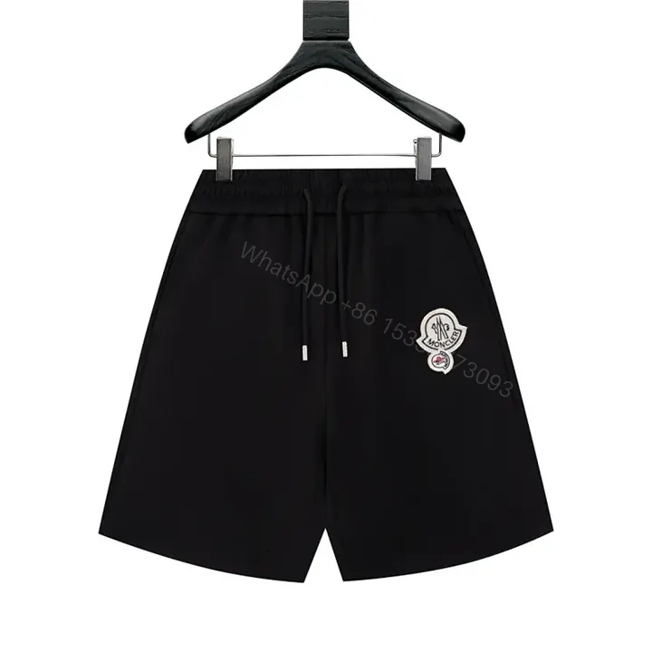 View 1 of Minimalist Black Swim Short with Crest – Luxe Everyday Comfort