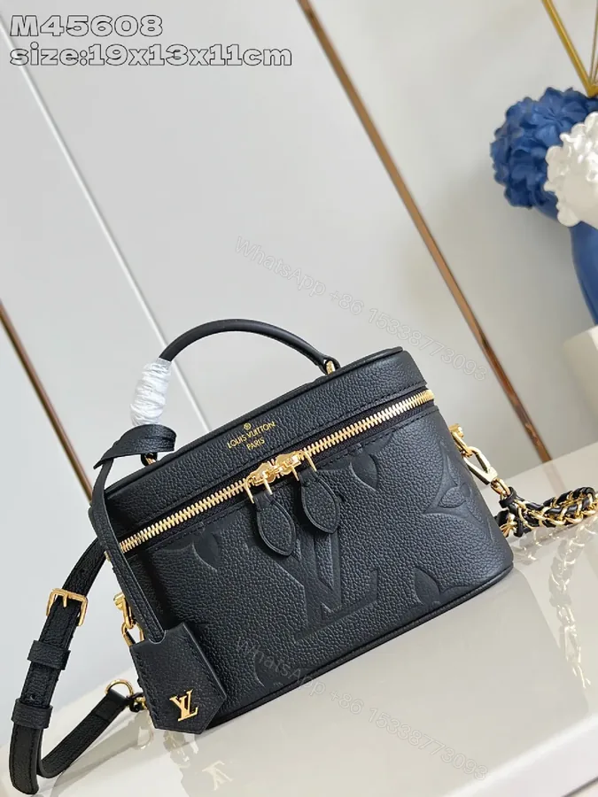 View 1 of Compact Luxury Crossbody in Textured Calfskin-Like Leather