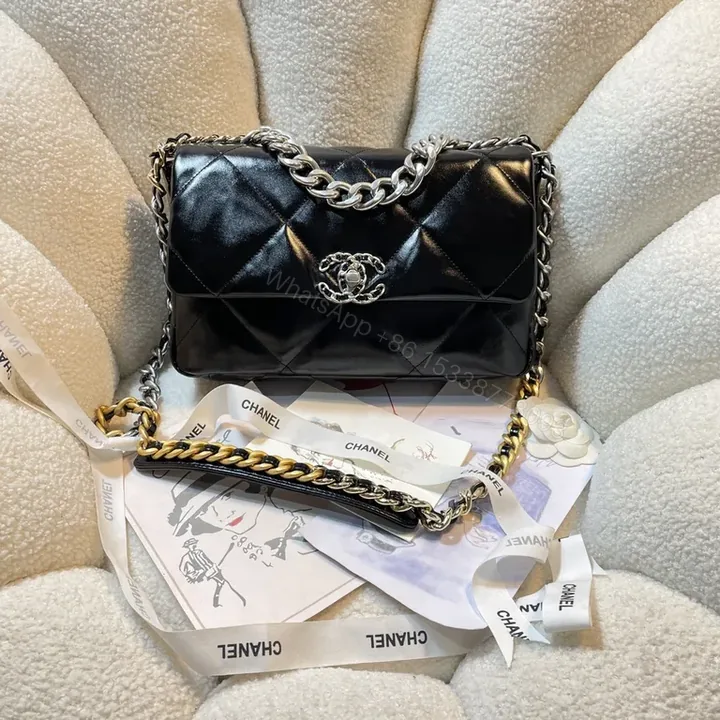 View 1 of Chic Quilted Flap Bag: Signature Chain, Leather, Day-to-Night