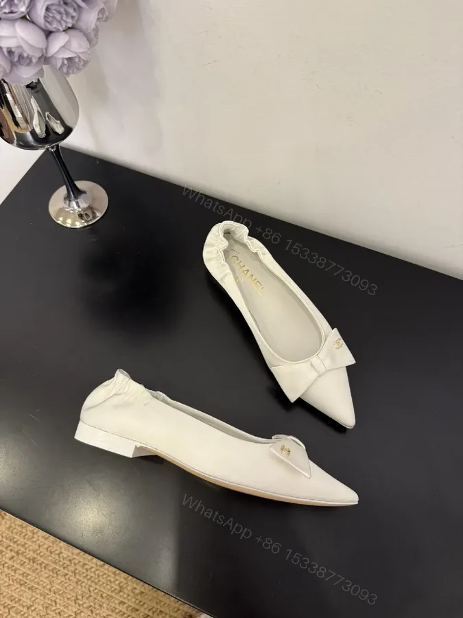 View 1 of White Textured Pointed-Toe Pumps with Bow, Luxury Flat