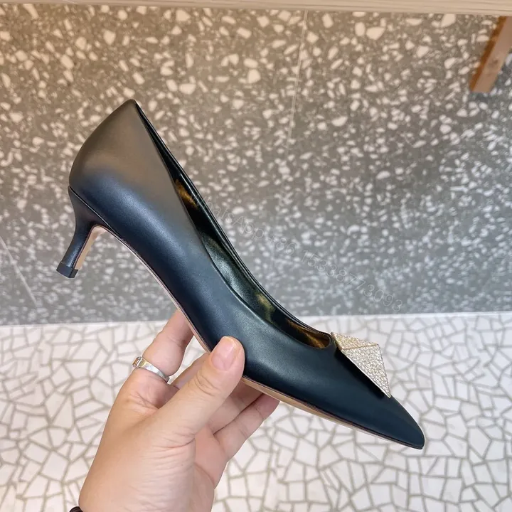 View 1 of Valentino Women Black Leather Embellished Pumps