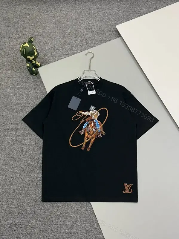 View 1 of Black Cotton Tee with Cowboy Motif & Hem LV Emblem, Premium Luxe Style