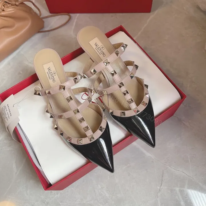 View 1 of Valentino Women Black Patent Leather Studded Mules
