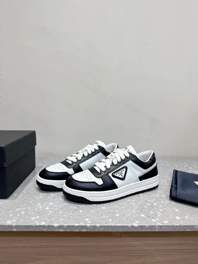 View 1 of Monochrome Leather Sneaker with Subtle Designer Detailing