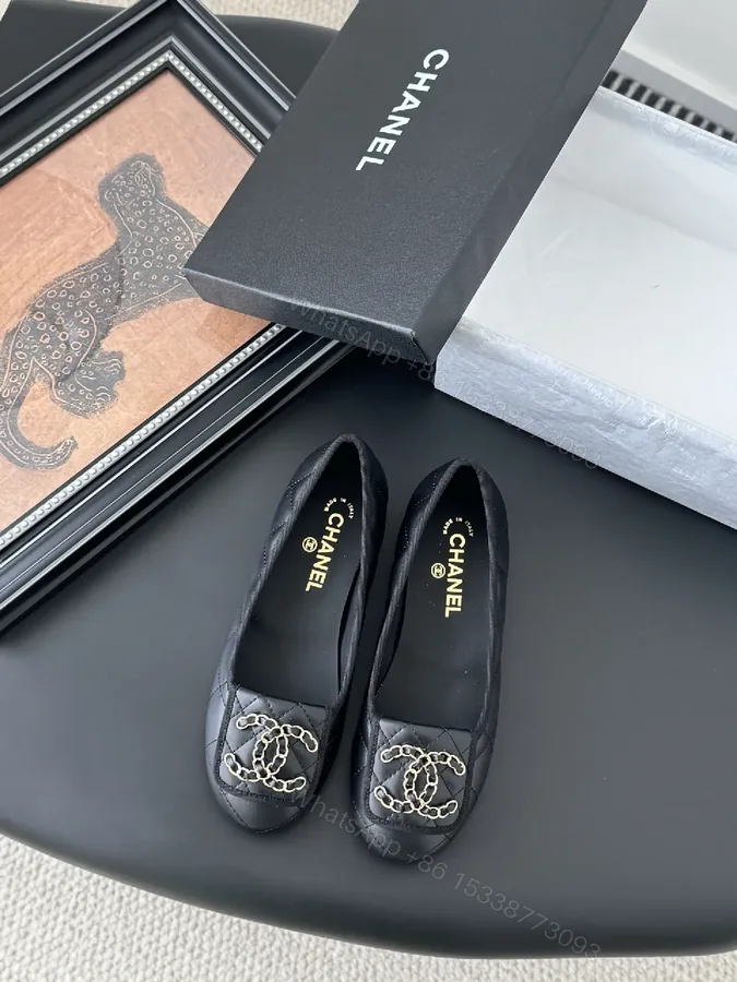 View 1 of Quilted Black Leather Slip-Ons with Gold Hardware Comfort Shoes