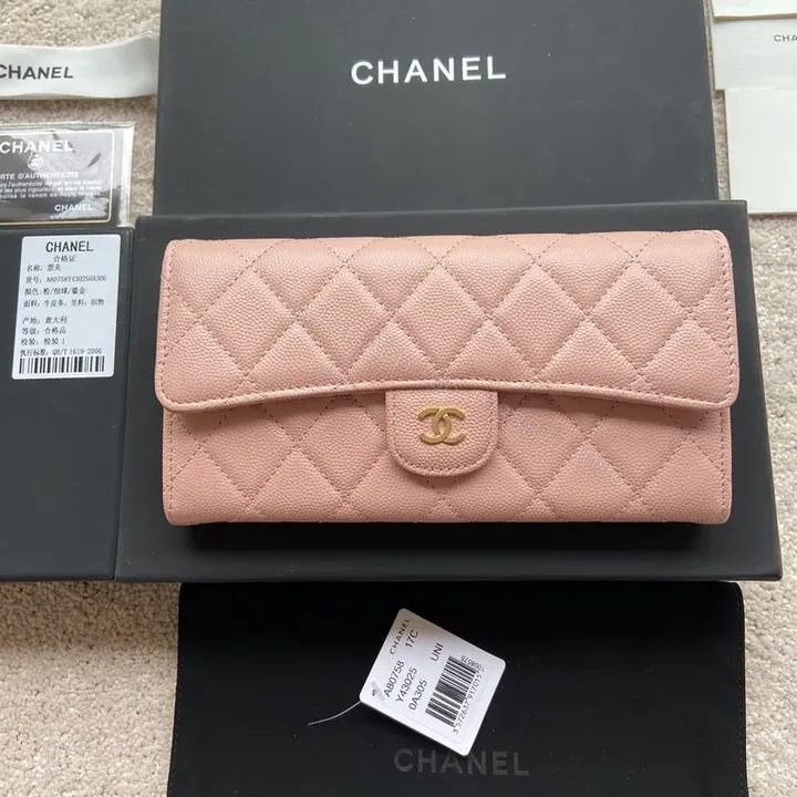 View 1 of Soft Pink Quilted Wallet with Gold Chanel Logo