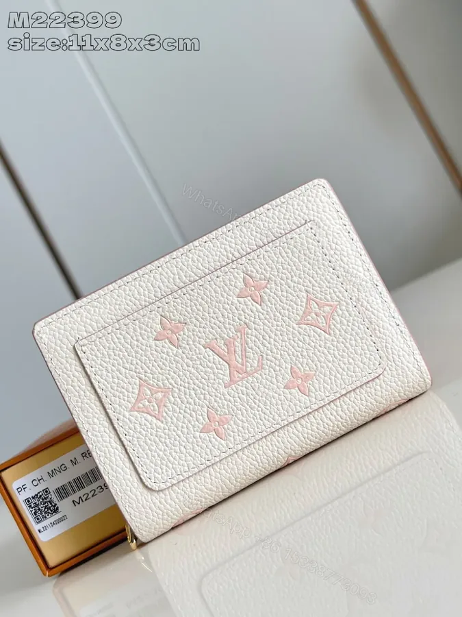 View 1 of Soft Pink Textured Leather Wallet - Compact Luxe Style with Monogram
