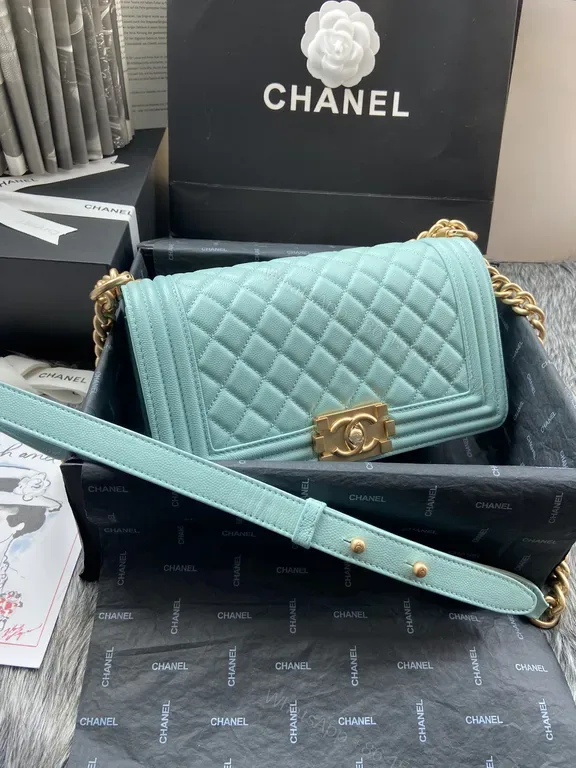View 1 of Pastel Turquoise Quilted Crossbody with Gold Hardware Bag