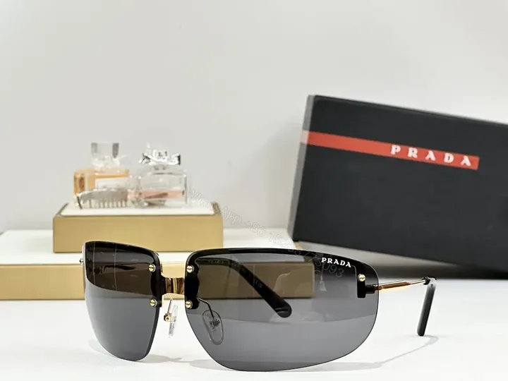 View 1 of Bold Rimless Sunglasses with Gold Hardware