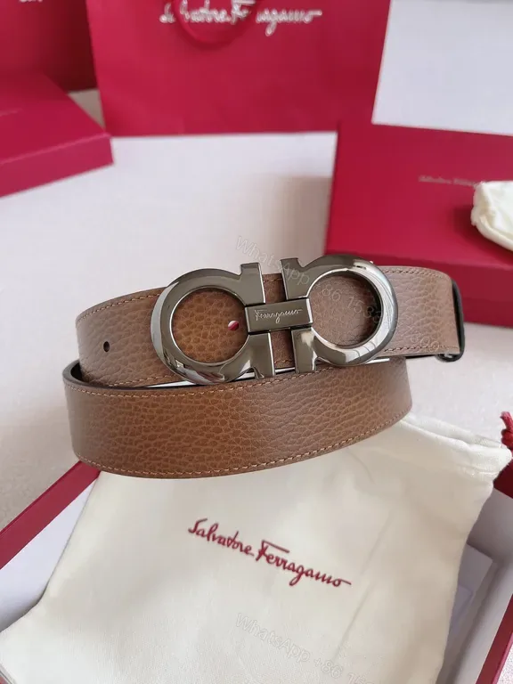 View 1 of Taupe Pebbled Leather Belt with Gancini Buckle - Ferragamo Style