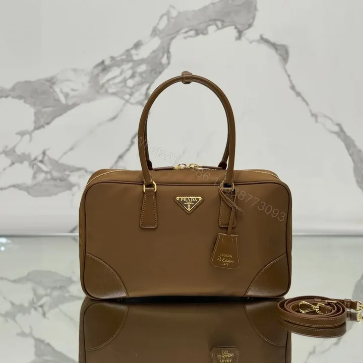 View 1 of LARGE TOP HANDLE BAG 35 IN CHERRY WOOD NYLON AND CALFSKIN TRIM