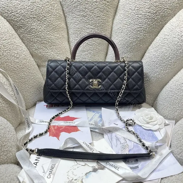 View 1 of Quilted Calfskin Shoulder Bag: Timeless Chic, Modern Versatility