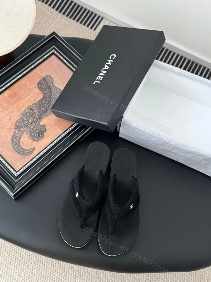 View 1 of Chanel Women Black Fabric Strap Flip Flop Sandals