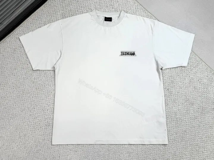 View 1 of White Cotton Tee with Minimalist Luxury Patch