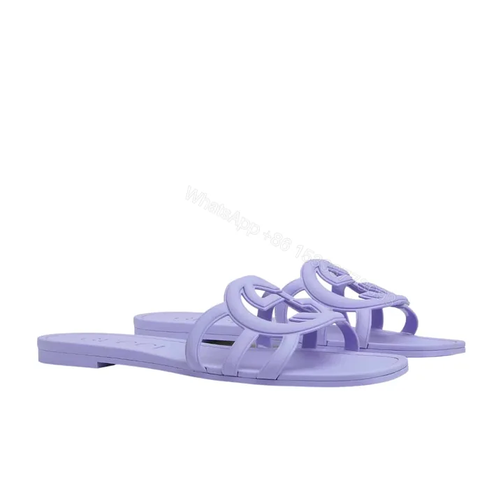 View 1 of GUCCI WOMEN’S INTERLOCKING G SLIDE SANDAL LILAC 780307 J8700 5316