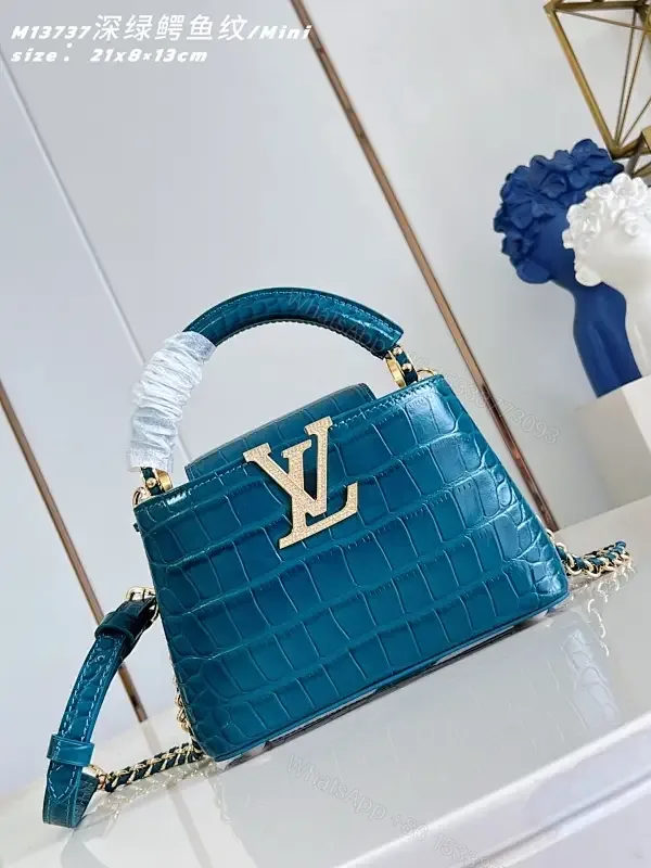 View 1 of Teal Crocodile-Texture Mini Bag with Gold Emblem