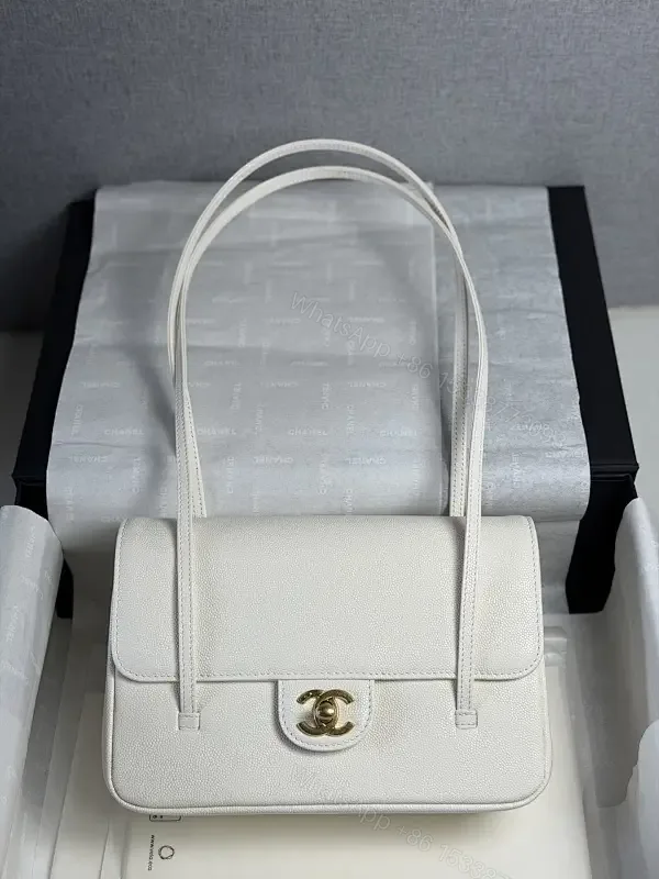 View 1 of Minimalist White Pebble Leather Shoulder Bag with Gold Hardware