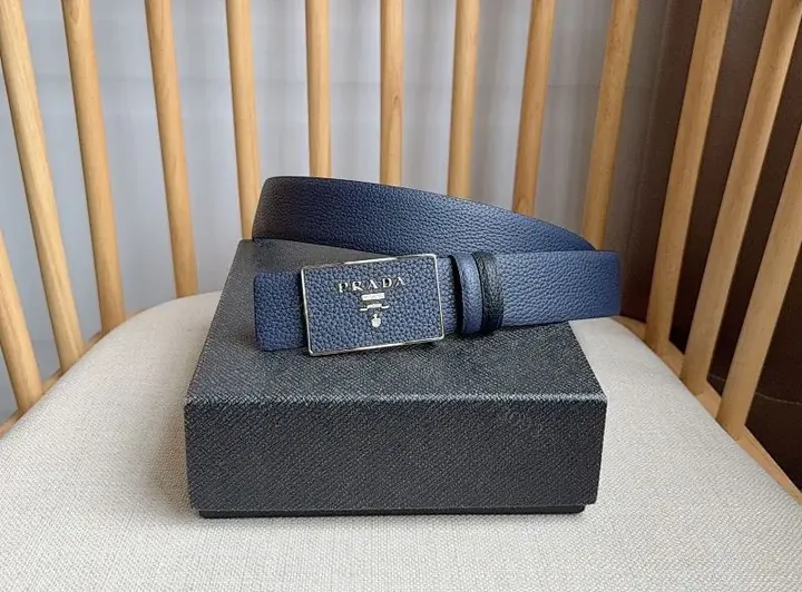 View 1 of Navy Textured Leather Belt with Brushed Metal Buckle