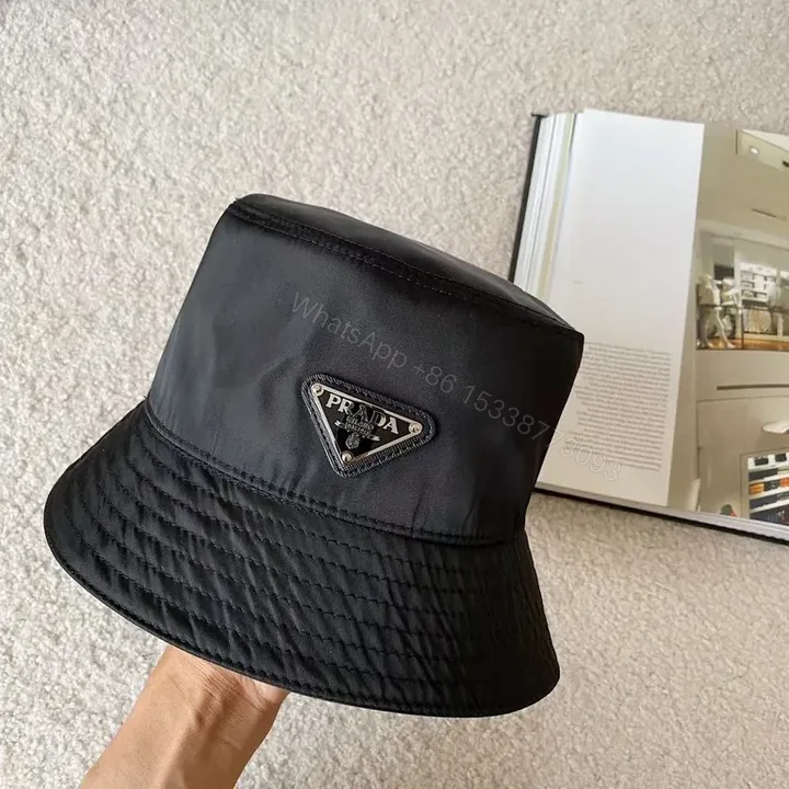 View 1 of Prada Black Nylon Logo Bucket Hat â€” Everyday Luxe