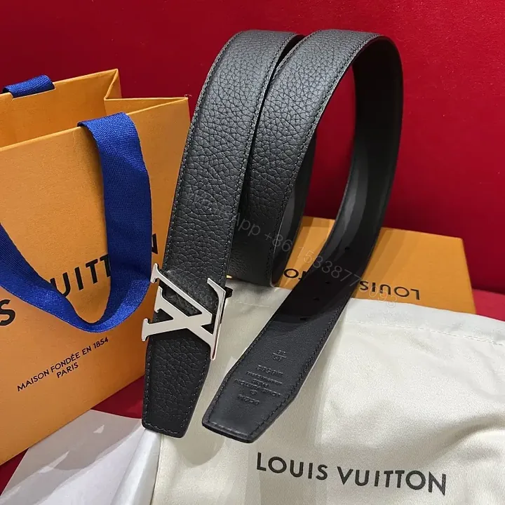 View 1 of Black Leather Pebbled Belt with Bold Silver LV Buckle
