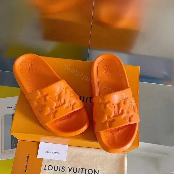 View 1 of Bold Monogram Slides: Orange LV Luxury Comfort Slides