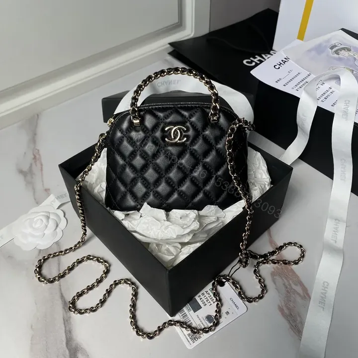 View 1 of Mini Quilted Black Flap Bag with Gold Chain â€” Everyday Luxe